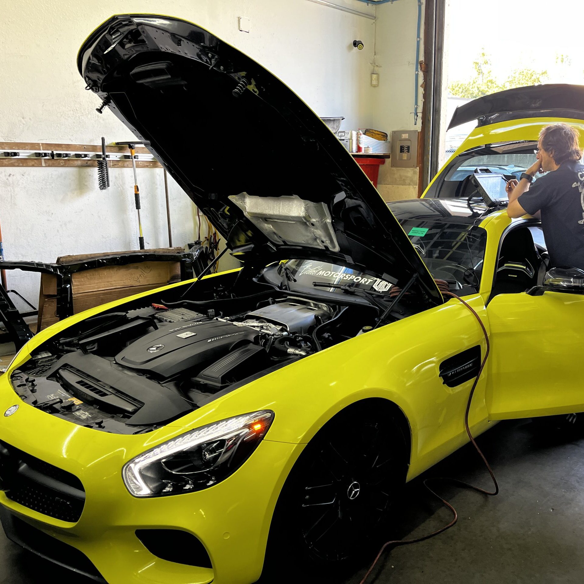 yellow mercedes slr | European Auto Clinic